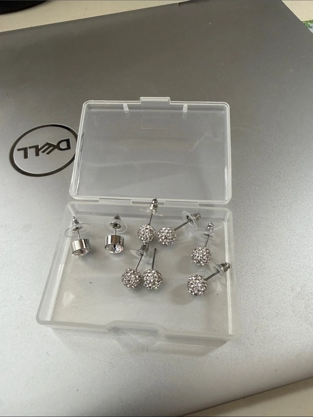 4 pairs sparkle studs. Never worn. So cute and sparkly.